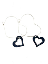 Load image into Gallery viewer, Heart shaped hoops with reversible black/red heart charms