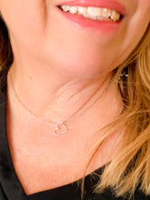 Load image into Gallery viewer, Necklace featuring one small heart in silver
