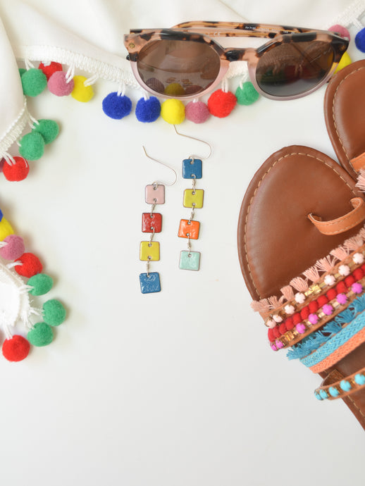 Packing for a Beach Day with Colorful Pompom Cover up and the Cascade Earrings