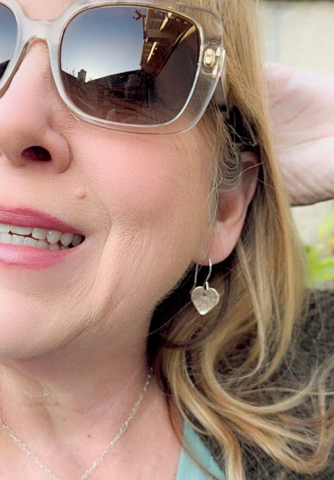 Heart shaped fine silver earrings made of Malibu Sand