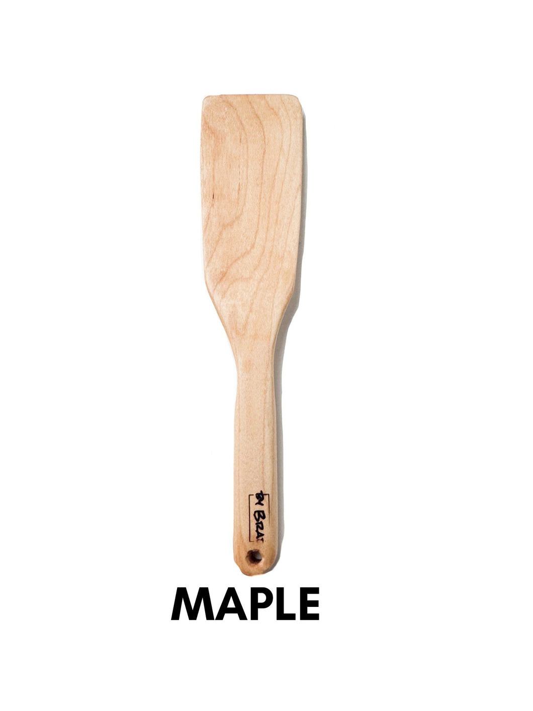 handcrafted wooden kitchen untensil in maple wood on a white background
