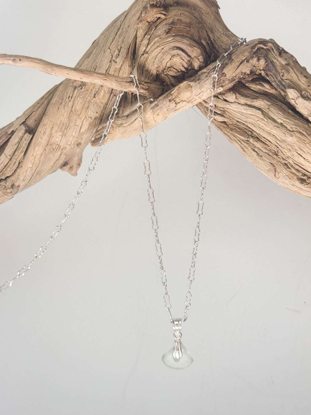 Tiny Sea glass pendant necklace on a sterling silver chain