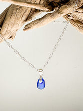 Load image into Gallery viewer, Tiny Sea glass pendant in blue on a sterling silver chain
