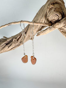 Single amber sea glass drop earrings on a sterling silver chain