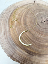 Load image into Gallery viewer, crescent shaped brass pendant with a 14K gold fill chain
