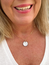 Load image into Gallery viewer, Medium circle pendant necklace on a model
