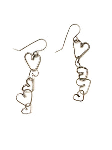 Dangle Earrings made of interlocking hearts  in silver